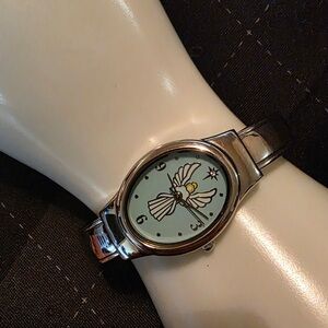 Vintage 1990s Avon Guardian Angel Silver-Tone Cuff Watch – Excellent Condition